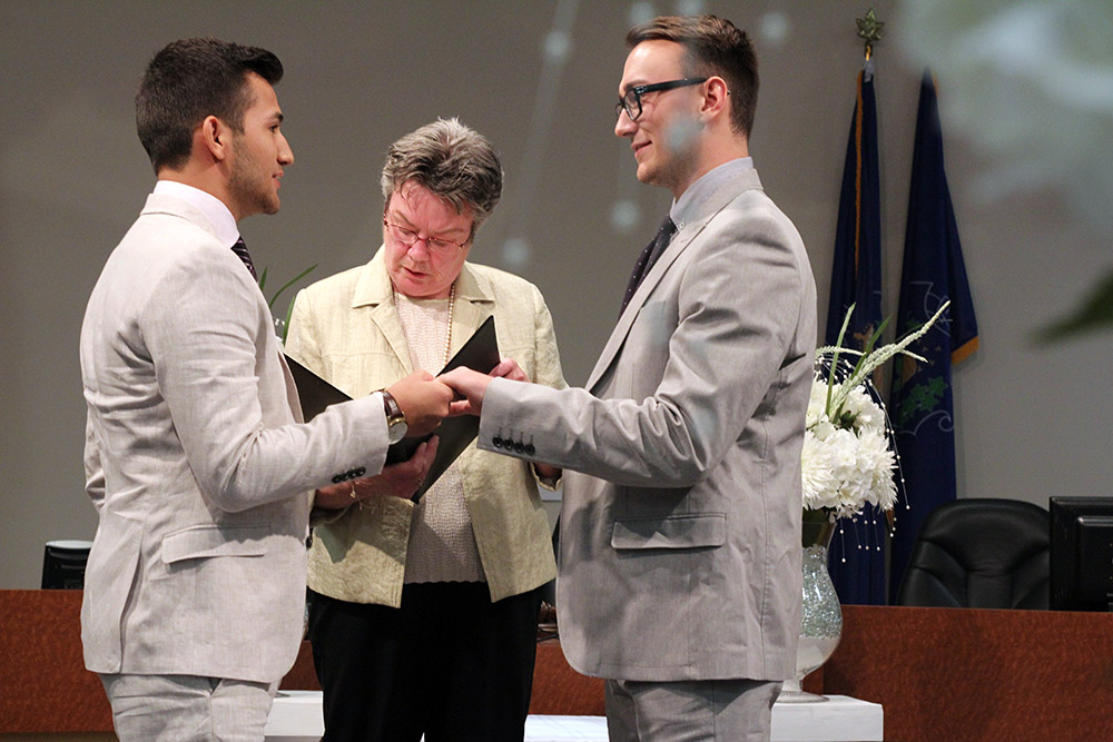 image of couple saying their vows